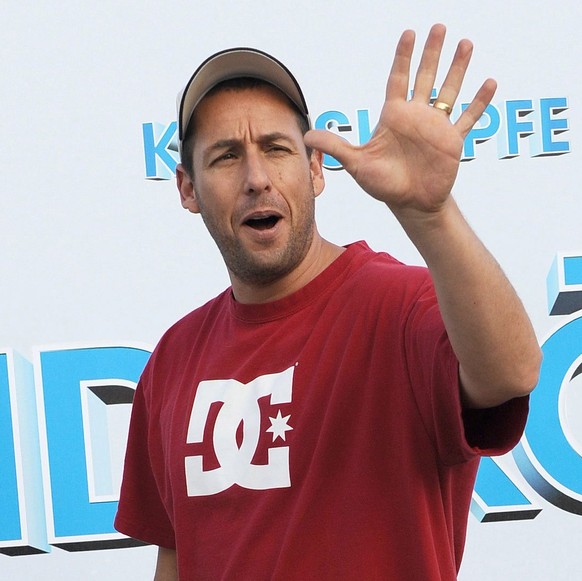 Adam Sandler epa05517955 (FILE) A file picture dated 30 July 2010 shows US actor Adam Sandler arriving for the premiere of his film 'Grown Ups' in Berlin, Germany. Sandler will celebrate his 50th birthday on 09 September 2016. EPA/JENS KALAENE *** Local Caption *** 02267426