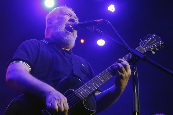 Frontman Pete Shelley of the British punk band Buzzcocks, performs at Plaza Condesa in the 6th edition of the Marvin Festival, in Mexico City, Saturday, May 19, 2018. (AP Photo/Marco Ugarte)