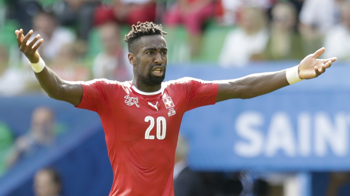 Switzerland's Johan Djourou gestures during the Euro 2016 round of 16 soccer match between Switzerland and Poland, at the Geoffroy Guichard stadium in Saint-Etienne, France, Saturday, June 25, 20 ...