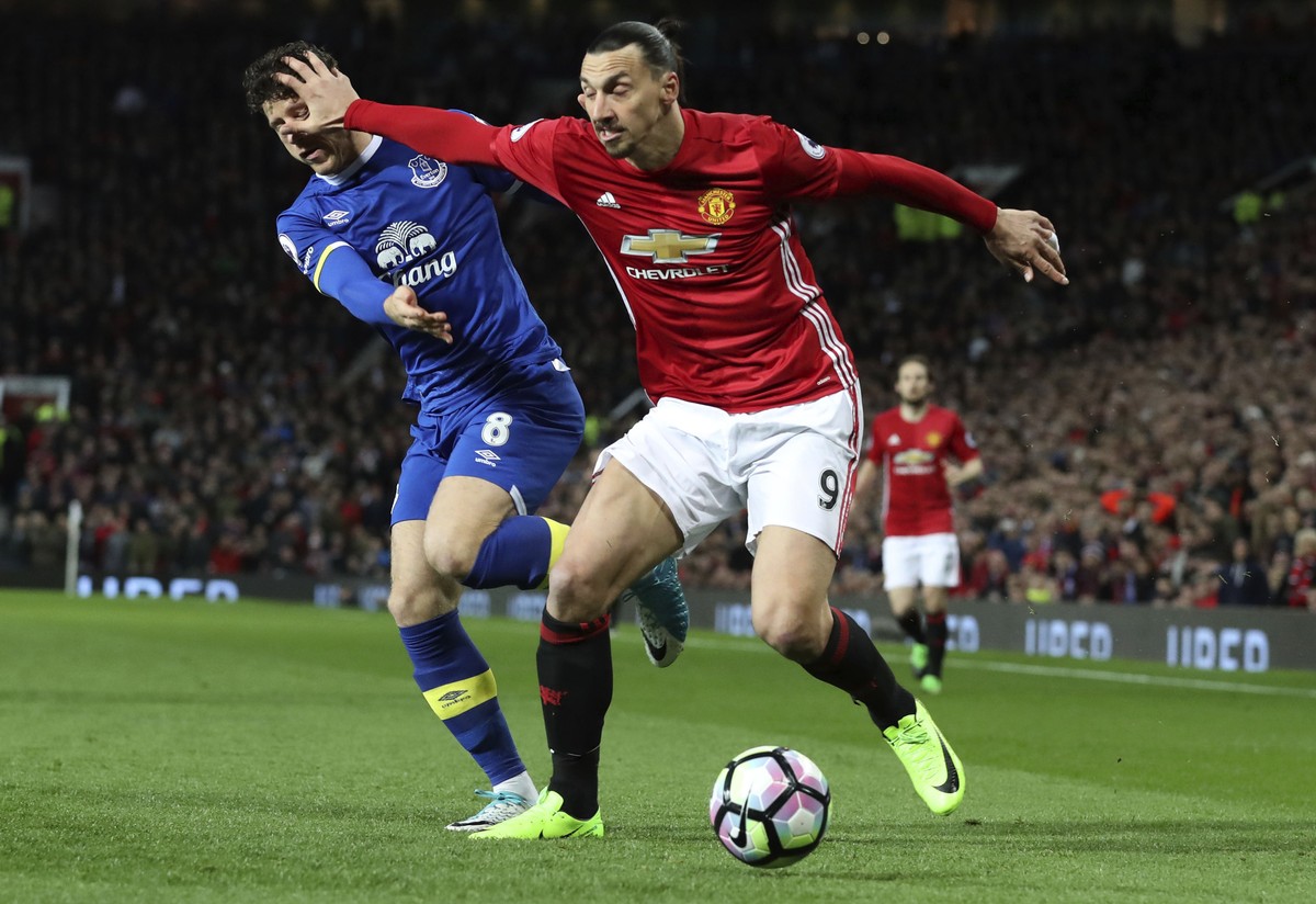 Everton's Ross Barkley, left, and Manchester United's Zlatan Ibrahimovic clash during their English Premier League soccer match between Manchester United and Everton at Old Trafford in Manch ...