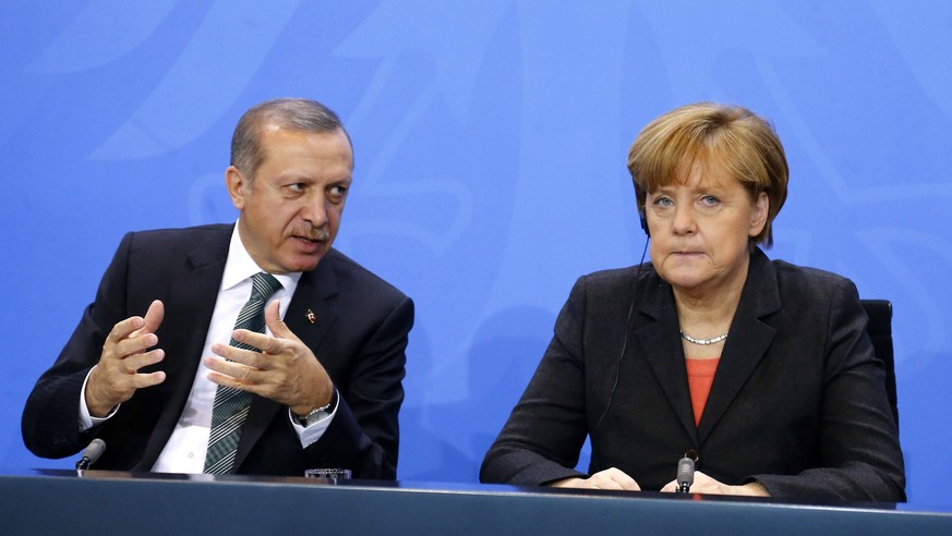 File photo of German Chancellor Angela Merkel and Turkey&#039;s Prime Minister Tayyip Erdogan addressing the media after talks in Berlin February 4, 2014. Germany&#039;s foreign intelligence agency ha ...