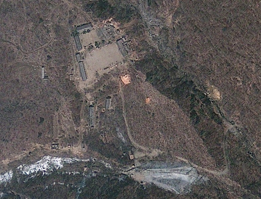 This April 18, 2012 satellite image provided by GeoEye shows North Korea&#039;s Punggye-ri nuclear test site. Commercial satellite imagery shows increased activity at North Korea’s nuclear test site b ...