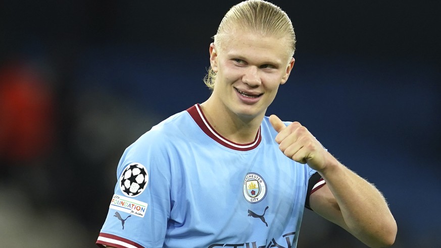 Manchester City's Erling Haaland celebrates at the end of the group G Champions League soccer match between Manchester City and Borussia Dortmund at the Etihad stadium in Manchester, England, Wednesda ...