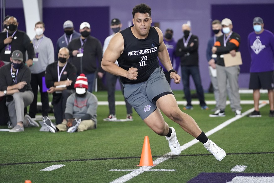 Northwestern offensive lineman Rashawn Slater participates in the school&#039;s Pro Day football workout for NFL scouts Tuesday, March 9, 2021, in Evanston, Ill. (AP Photo/Charles Rex Arbogast)
Peyton ...