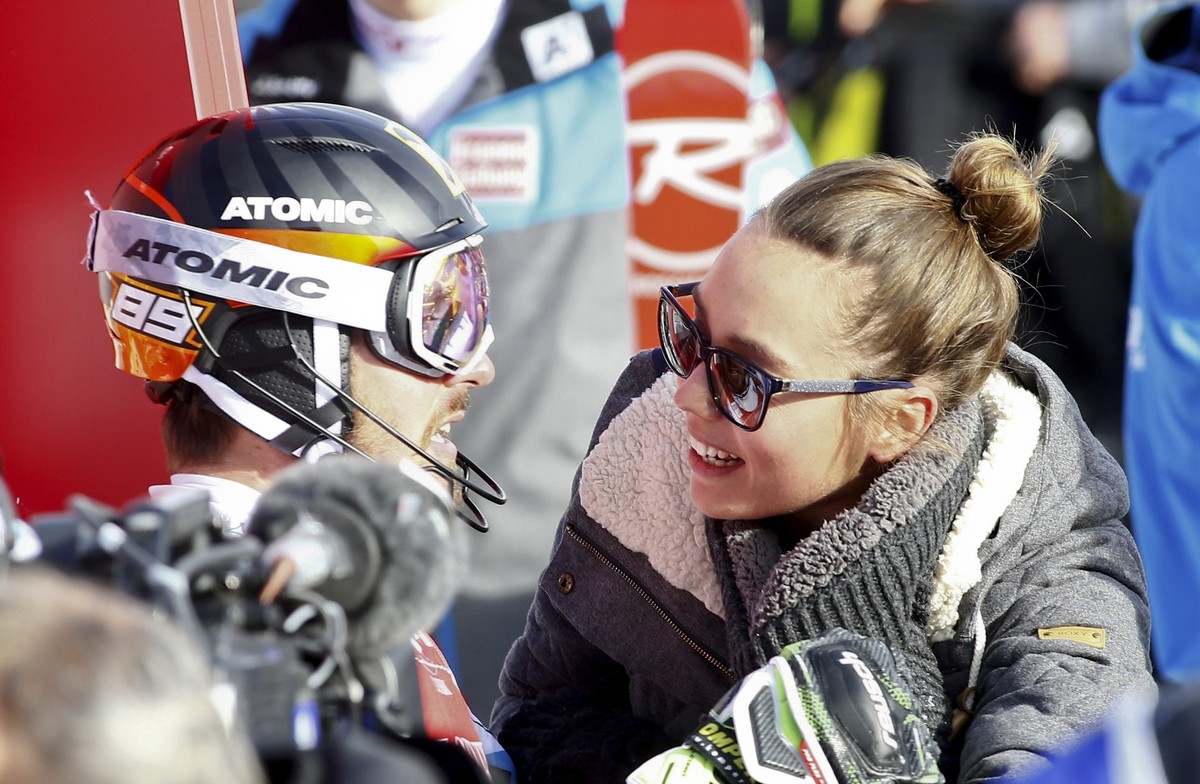Austria's Marcel Hirscher talks with his Girlfriend Laura Moisl after completing an alpine ski, men's World Cup slalom, in Val d'Isere, France, Sunday, Dec. 11, 2016. (AP Photo/Giovanni ...