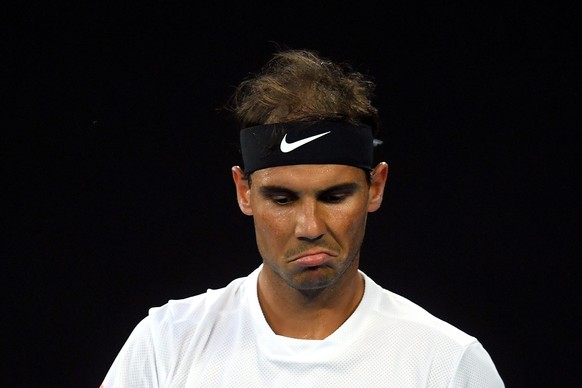 epa05753734 Rafael Nadal of Spain reacts during his Men&#039;s Singles semifinal match against Grigor Dimitrov of Bulgaria at the Australian Open Grand Slam tennis tournament in Melbourne, Australia,  ...