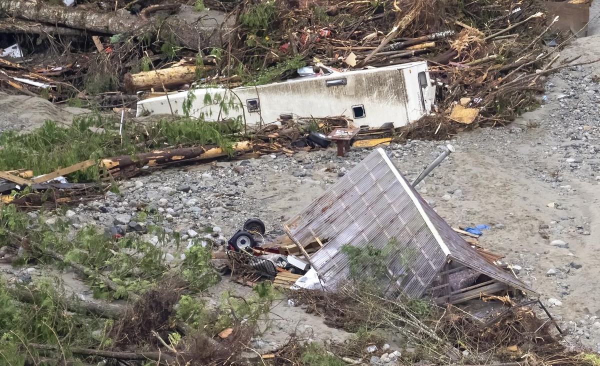 In this aerial photo, damage caused by heavy rains and mudslides earlier in the week is pictured along the Coquihalla Highway near Hope, British Columbia, Thursday, Nov. 18, 2021. (Jonathan Hayward/Th ...