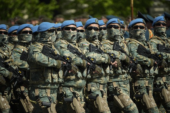 epa12086332 Azerbaijan&#039;s servicemen march along Red Square during the Victory Day military parade in Moscow, Russia, 09 May 2025. Russia marks the 80th anniversary of the victory in World War II  ...