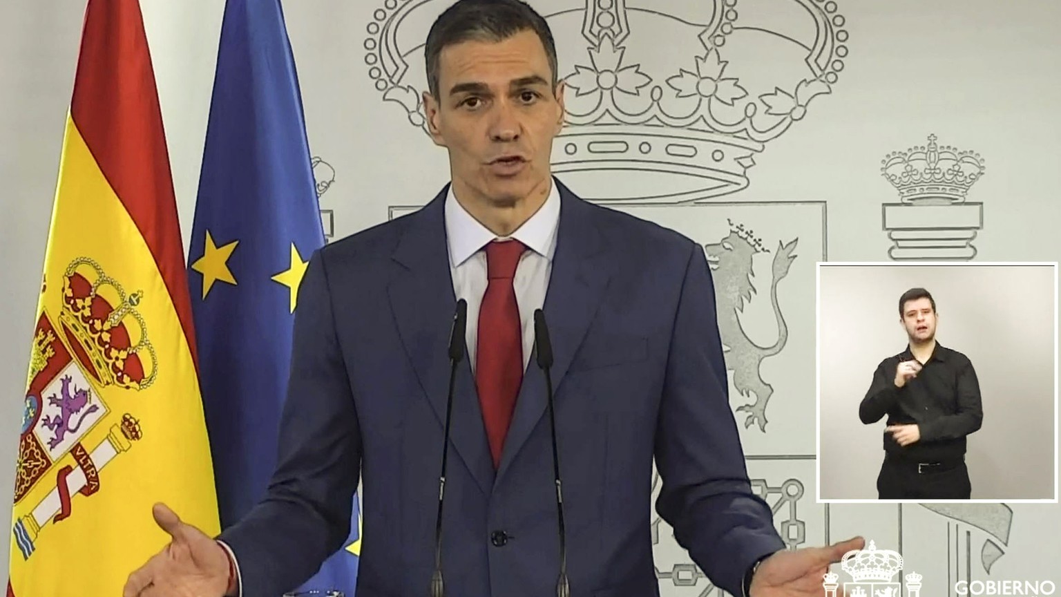 epa12793664 A handout screen grab taken from a video and made available by the Moncloa Presidential Palace shows Spanish Prime Minister Pedro Sanchez speaking during an institutional statement at the  ...