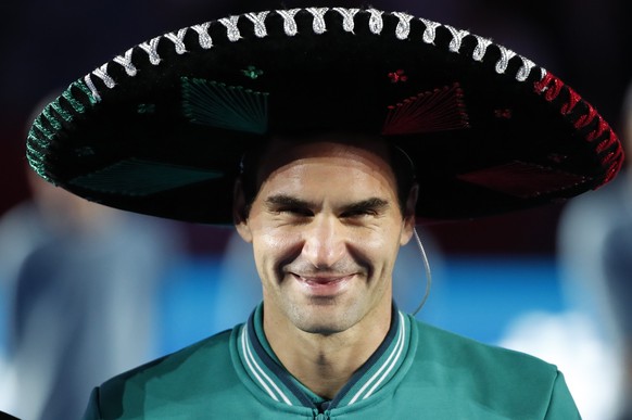 epa08021466 Swiss tennis player Roger Federer poses for the cameras after an exhibition match at Monumental Plaza de Toros Mexico bullring in Mexico City, Mexico, 23 November 2019 (issued 25 November  ...