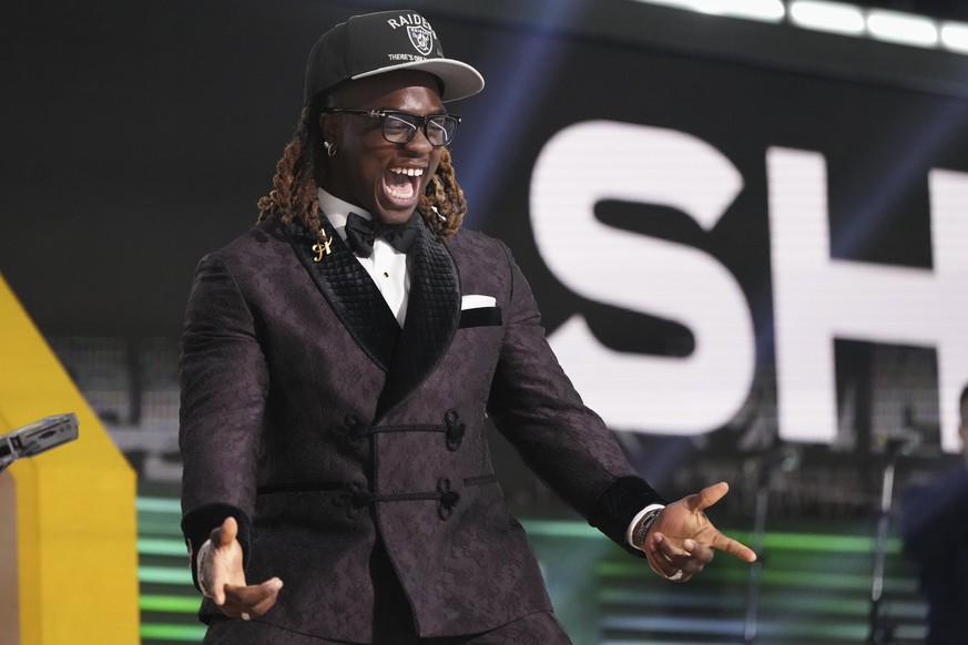 Boise State running back Ashton Jeanty celebrates after being chosen by the Las Vegas Raiders with the sixth overall pick during the first round of the NFL football draft, Thursday, April 24, 2025, in ...