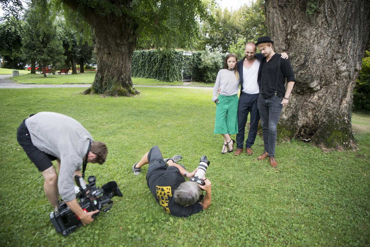 epa06130006 Swiss actress Jasna Fritzi Bauer, left, Swiss Film Director Dominik Locher, centre, and Swiss actor Sven Schenker, right, poses during the photocall for the film "Goliath" at the ...