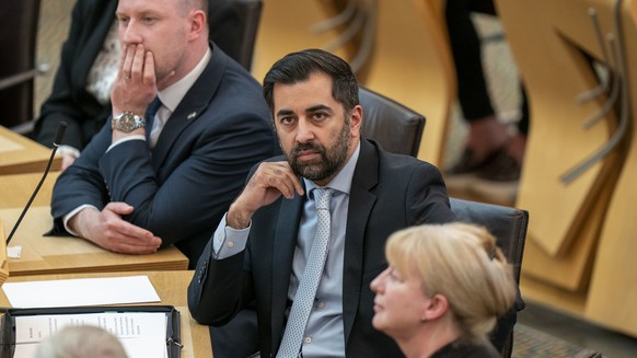 Scottish First Minister Humza Yousaf attends a debate on a motion of no confidence in the Scottish Government, at the Scottish Parliament in Holyrood, Edinburgh, Wednesday May 1, 2024. (Jane Barlow/PA ...