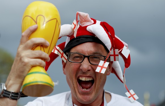 An England fan poses for a picture before the semifinal match between Croatia and England at the 2018 soccer World Cup in the Luzhniki Stadium in Moscow, Russia, Wednesday, July 11, 2018. (AP Photo/Re ...