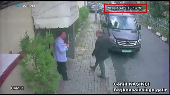 epa07083705 A frame grab from a police CCTV video made available through Turkish Newspaper Sabah allegedly shows Saudi journalist Jamal Khashoggi (R) entering the Saudi consulate in Istanbul, Turkey,  ...