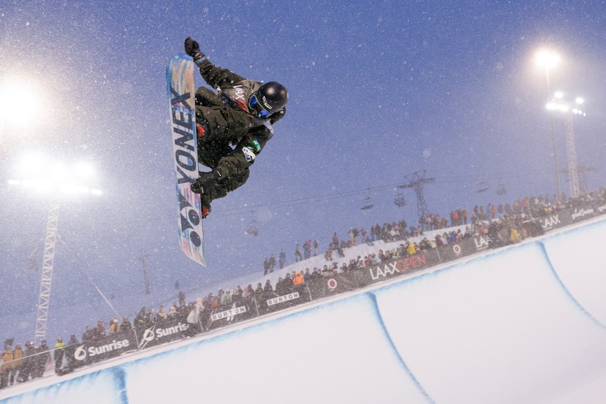 epa10420967 Ruka Hirano of Japan trains before the final run of the Fis Snowboard World Cup 2023 Halfpipe competition, which was postponed due to fog and wind, at Laax Open in Laax, Switzerland, 21 Ja ...