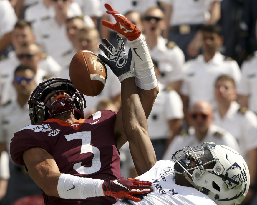 FILE - In this Sept. 7, 2019, file photo, Virginia Tech defender Caleb Farley (3) breaks up a pass in the end zone intended for Old Dominion receiver Hassan Patterson, right, during the second half of ...
