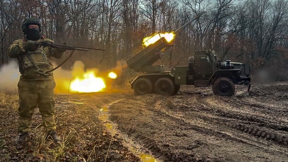In this photo, taken from video and released by the Russian Defense Ministry Press Service on Thursday, Jan. 16, 2025, A Russian &quot;Grad&quot; self-propelled multiple rocket launcher fires towards  ...