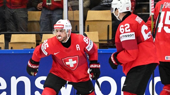 09/05/2025, Herning, Jyske Bank Boxen, IIHF World Championship, WM, Weltmeisterschaft Switzerland - Czechia, Switzerland celebrate a goal. From left: scorer Sven Andrighetto of Switzerland, Denis Malg ...
