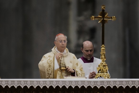 Cardinal Protodeacon Dominique Mamberti celebrates a mass on the last of nine days of mourning for late Pope Francis, in St. Peter&#039;s Basilica at the Vatican, Sunday, May 4, 2025. (AP Photo/Gregor ...