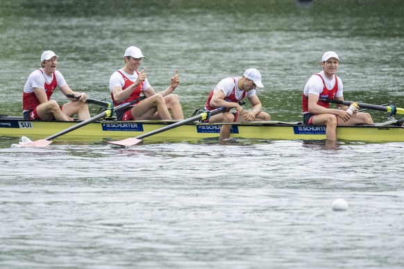Kai Schaetzle, Patrick Brunner, Tim Roth and Joel Schuerch, from Switzerland at the Men&#039;s Four race at the World Rowing Final Olympic Qualification regatta on Lake Rotsee in Lucerne, Switzerland, ...
