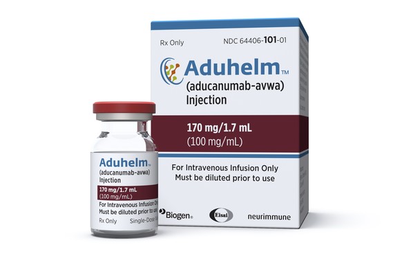 This image provided by Biogen on Monday, June 7, 2021 shows a vial and packaging for the drug Aduhelm. On Monday, June 7, 2021, the Food and Drug Administration