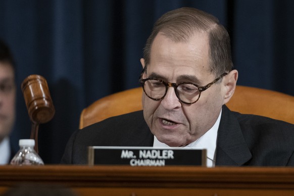 House Judiciary Committee Chairman Rep. Jerrold Nadler, D-N.Y., gavels a recess of a House Judiciary Committee markup of the articles of impeachment against President Donald Trump and announces the co ...