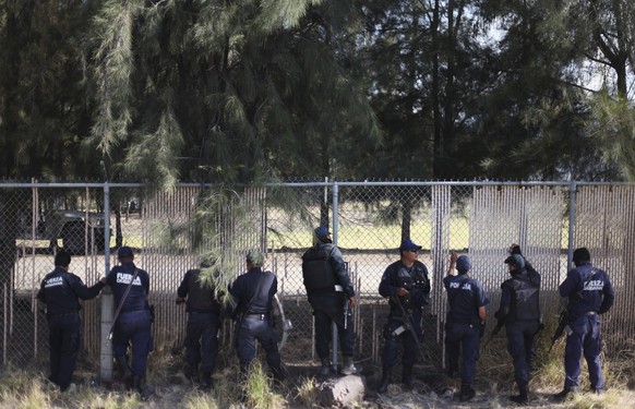 Polizisten beim Tatort in Michoacán.