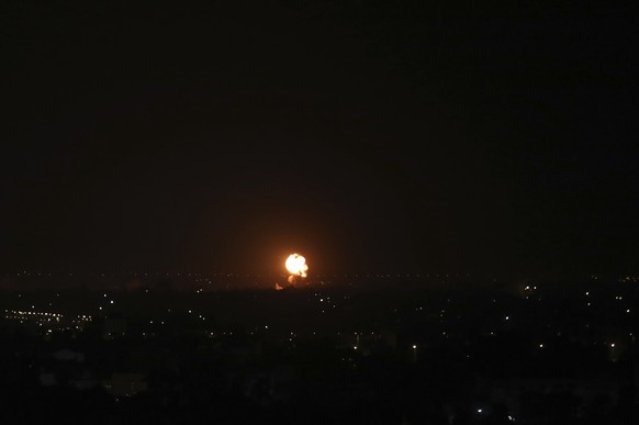 An explosion caused by Israeli airstrikes is seen on Gaza City, Friday, Nov. 4, 2022. Early Friday, Israeli aircraft struck several targets in the Gaza Strip in response to rocket fire Thursday evenin ...