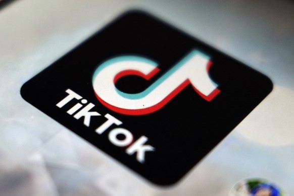 FILE - The TikTok app logo is seen, Sept. 28, 2020, in Tokyo. On Wednesday, Nov. 29, 2023, an Indiana county judge dismissed a lawsuit filed by the state accusing TikTok of deceiving its users about t ...