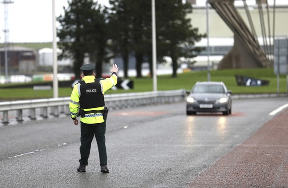 Police patrol the port of Larne, on the north coast of Northern Ireland, Thursday, Dec. 31, 2020, as the P&amp;O ferry to Scotland prepares to leave. At 11 p.m. London time â?? midnight in Brussels â? ...