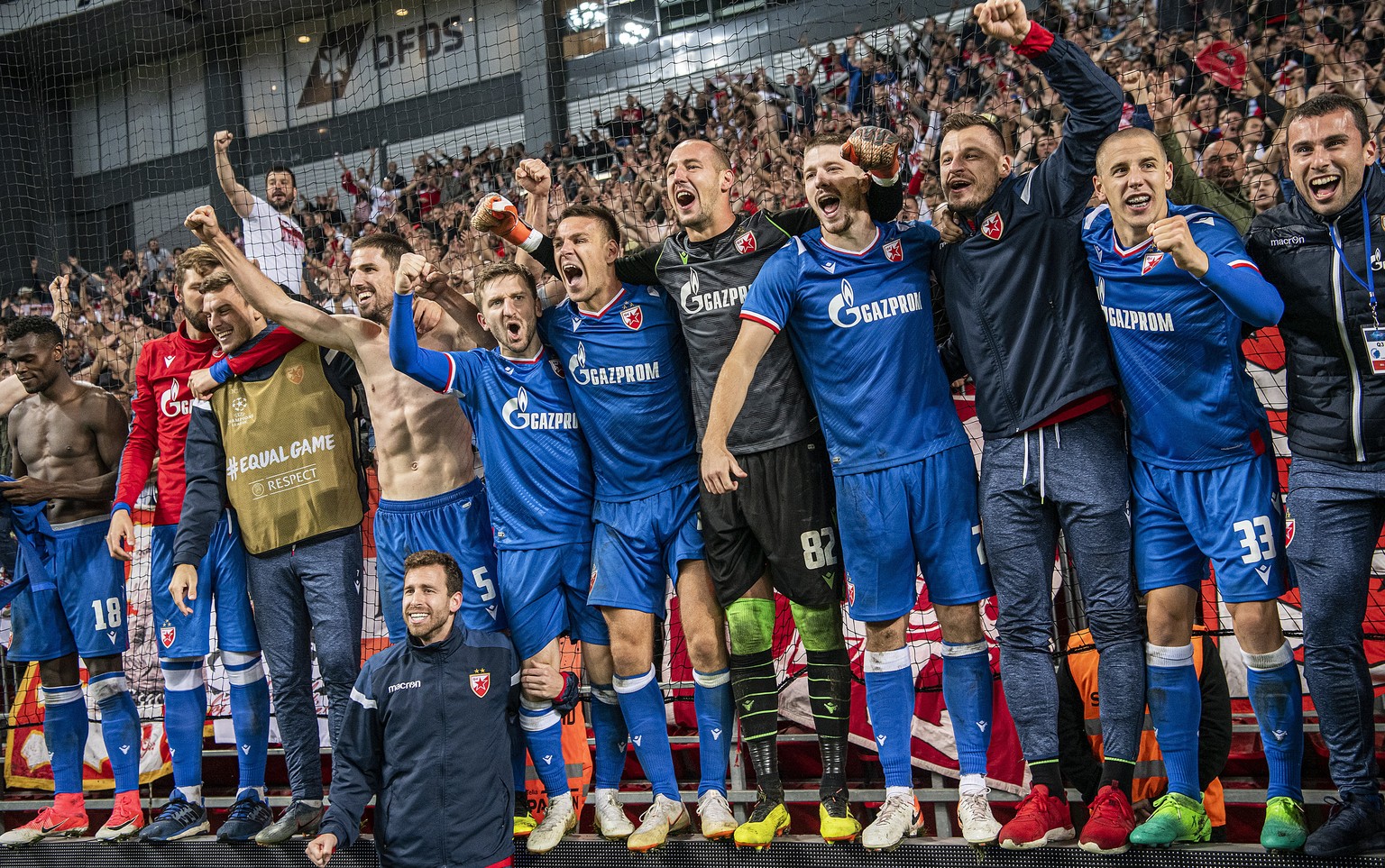 epa07772109 Players of Red Star Belgrade celebrate after winning the penalty shoot-out in the UEFA Champions League third qualifying round second leg soccer match between FC Copenhagen and Red Star Be ...