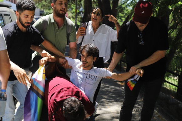 People are detained by police as they attempt to hold a Pride march, in Istanbul, Turkey, Sunday, June 28, 2026. (AP Photo/Dilara Acikgoz)
Turkey LGBTQ