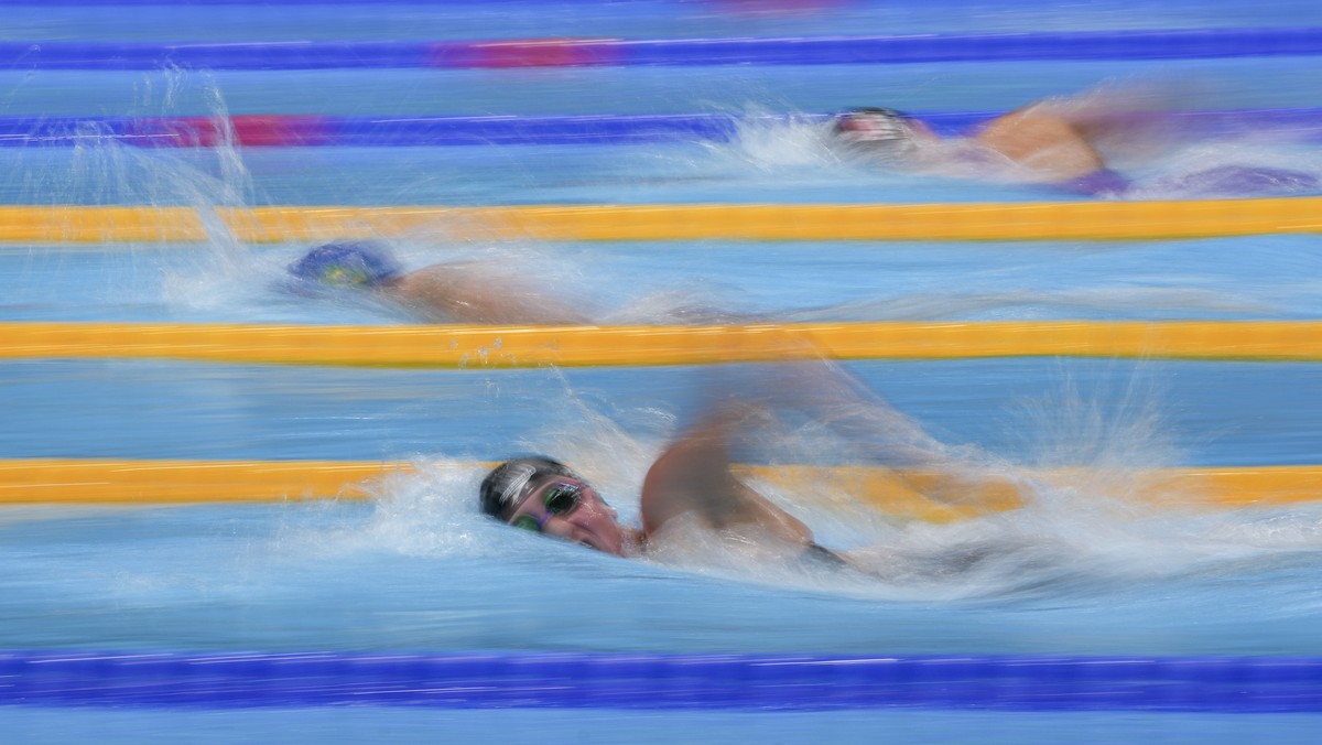 Eve Thomas, of New Zealand, swims in a heat during the women's 1500-meter freestyle at the 2020 Summer Olympics, Monday, July 26, 2021, in Tokyo, Japan. (AP Photo/Matthias Schrader)