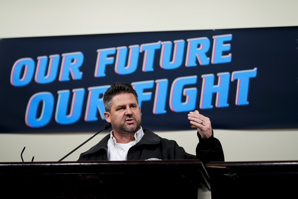 IAM District 751 president Jon Holden speaks to union members while announcing that they voted to reject a new contract offer from Boeing, Wednesday, Oct. 23, 2024, at Seattle Union Hall in Seattle. ( ...