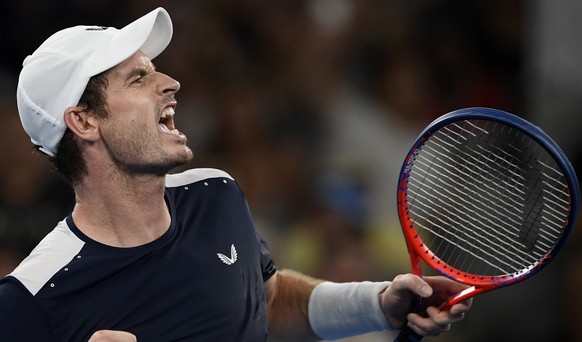 Britain&#039;s Andy Murray celebrates after winning the the third set tie-breaker against Spain&#039;s Roberto Bautista Agut during their first round match at the Australian Open tennis championships  ...