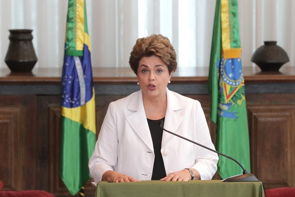 Brazil&#039;s suspended President Dilma Rousseff reads a letter to the people and to the Senate from Alvorada Palace, in Brasilia, Brazil, Tuesday, Aug. 16, 2016. President Rousseff is proposing to le ...