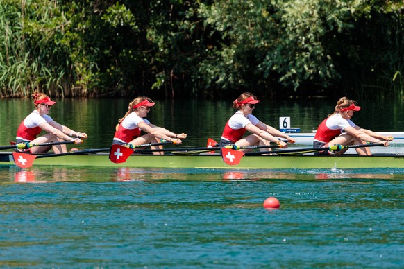 Nina Wettstein, Celia Dupre, Flavia Loetscher and Lisa Loetscher of Switzerland, from left, compete in the Women's Quadruple Sculls Final A on the third day of the 2026 World Rowing Cup at Rotsee ...