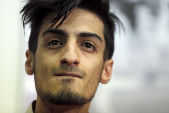 Mourad Laachraoui, Belgian Taekwondo athlete and brother of Najim Laachaoui, implicated in the Brussels bombing attacks, addresses a press conference in Brussels, Belgium, March 24, 2016. REUTERS/Chri ...