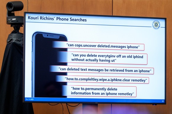 Internet searches recovered from the phone of Kouri Richins, a Utah mother accused of fatally poisoning her husband, are displayed on a screen during her murder trial at the Summit County Courthouse i ...