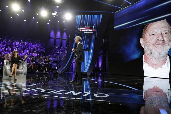 epa07059808 Italian actress Asia Argento (L) during the Italian La7 TV program &#039;Non e l&#039;Arena&#039;, conducted by Massimo Giletti (R), in Rome, Italy, 30 september 2018. According to reports ...