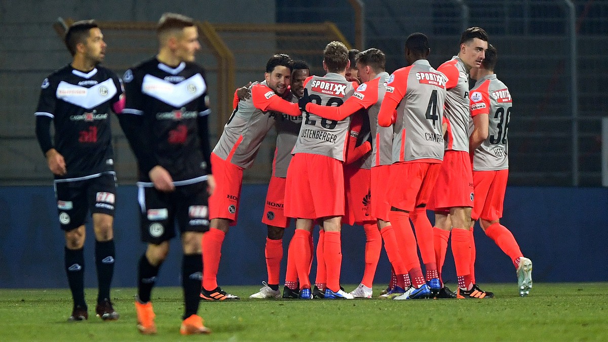 Young Boys's player Christian Fassnacht celebrates the 0-1 goal with teammates, during the Super League soccer match FC Lugano against BSC Young Boys, at the Cornaredo stadium in Lugano, Wednesda ...
