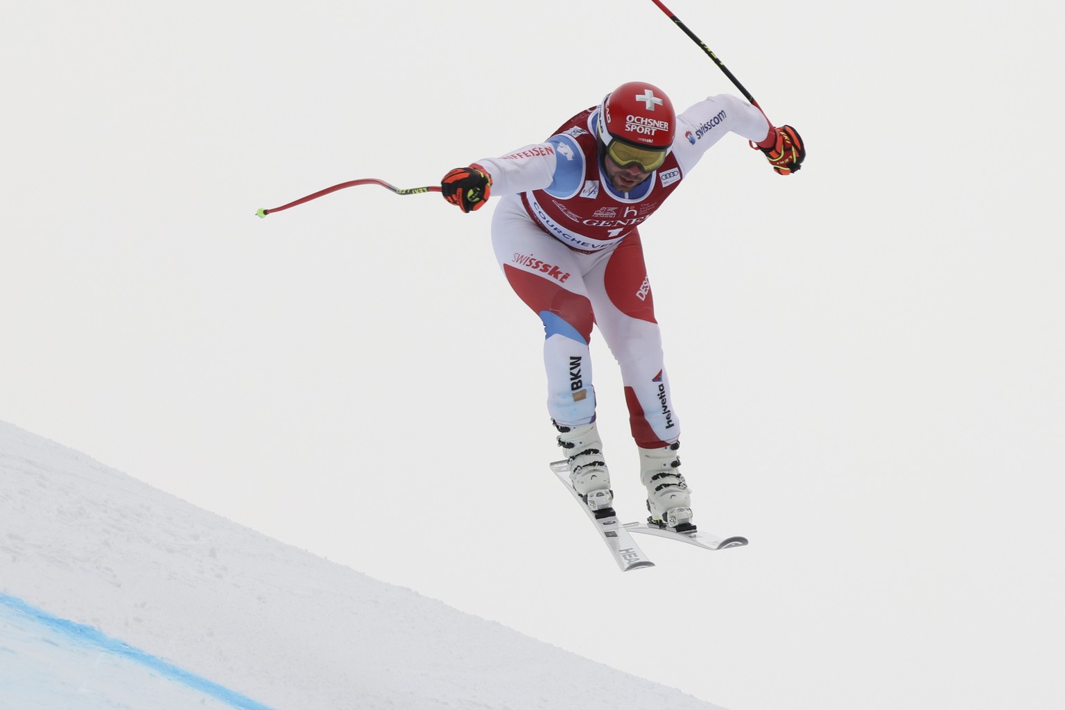 Switzerland&#039;s Beat Feuz speeds down the course during an alpine ski, men&#039;s World Cup Finals downhill training, in Courchevel, France, Tuesday, March 15, 2022. (AP Photo/Marco Trovati)