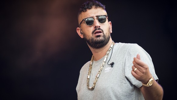Aykut Anhan, aka Haftbefehl, of Germany performs during the Openair Frauenfeld music festival on Friday, July 8, 2016, in Frauenfeld, Switzerland. The 22th Openair Frauenfeld takes place from 7 to 9 J ...