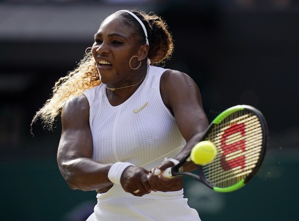 epa07695213 Serena Williams of the US returns to Kaja Juvan of Slovenia in their second round match during the Wimbledon Championships at the All England Lawn Tennis Club, in London, Britain, 04 July  ...