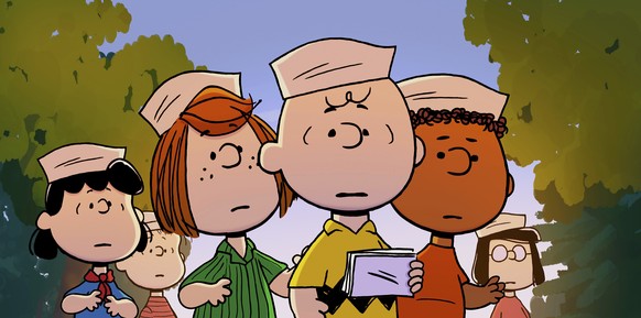 This image released by Apple TV+ shows characters, from left, Lucy, Linus, Peppermint Patty, Charlie Brown, Franklin and Marcie in a scene from "Snoopy Presents: A Summer Musical." (Apple TV ...