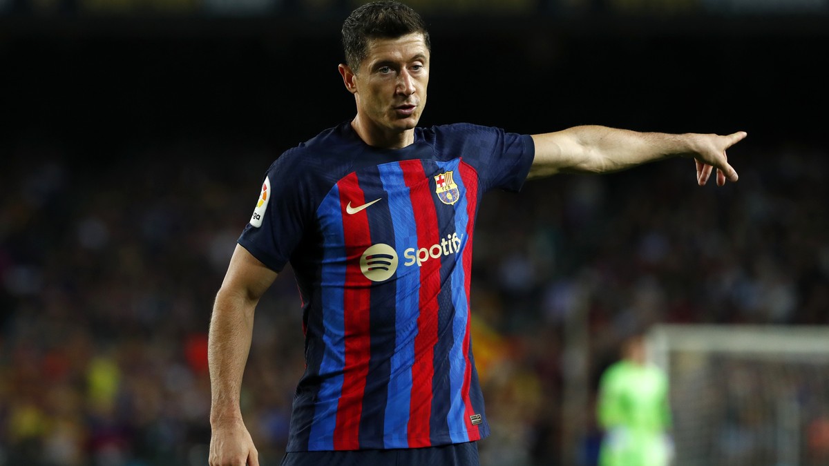Barcelona's Robert Lewandowski gestures during a Spanish La Liga soccer match between FC Barcelona and Celta Vigo at Camp Nou stadium in Barcelona, Spain, Sunday, Oct. 9, 2022. (AP Photo/Joan Mon ...