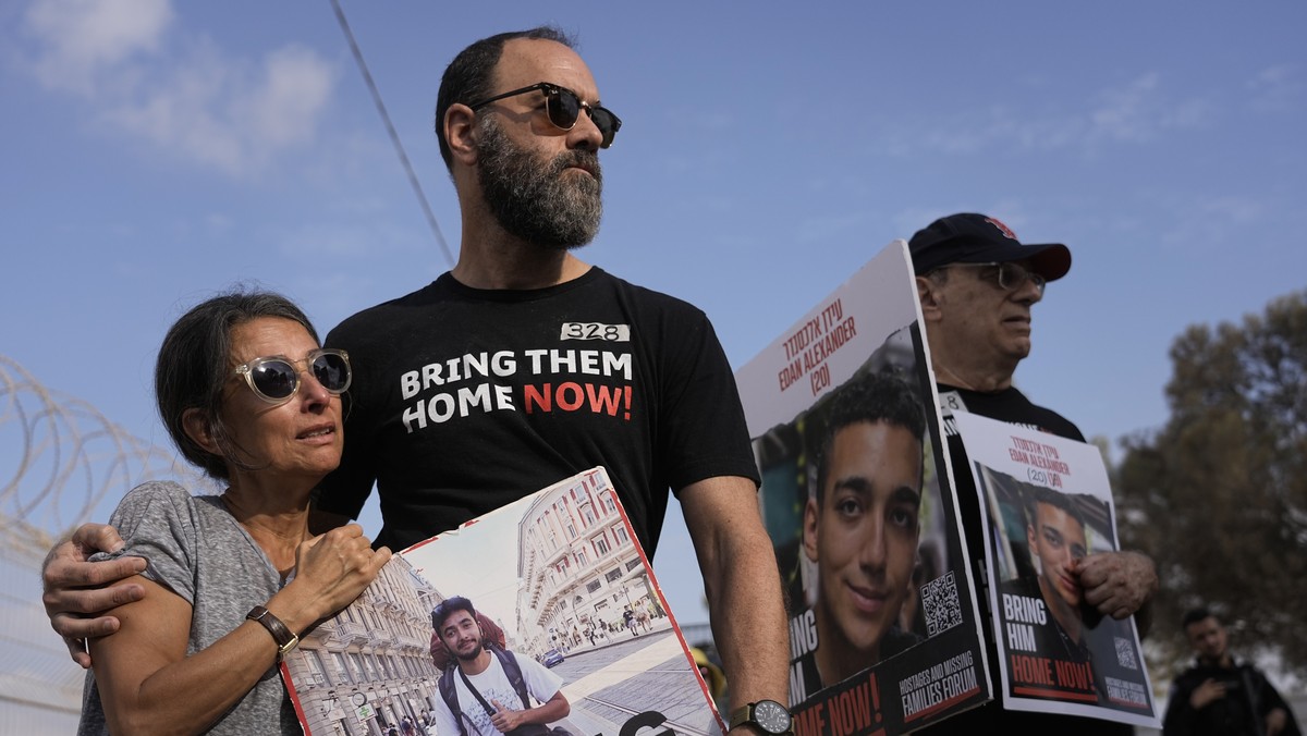 FILE - Rachel Goldberg, left, and Jon Polin center, parents of Israeli-American hostage Hersh Goldberg-Polin, along with other relatives of hostages held in the Gaza Strip by the Hamas militant group  ...