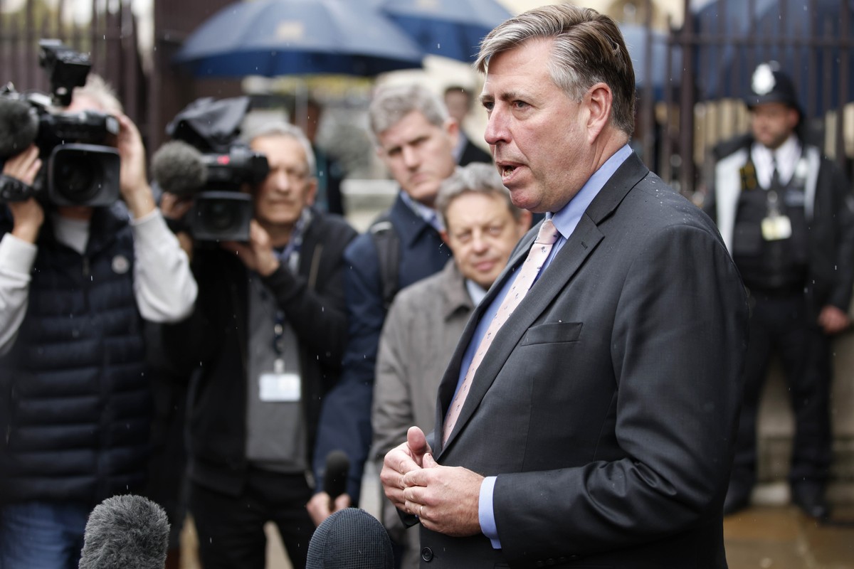 Graham Brady, Chairman of the 1922 Committee, speaks to media in front of parliament in London, Thursday, Oct. 20, 2022. Britain's Prime Minister liz Truss resigned Thursday, bowing to the inevit ...