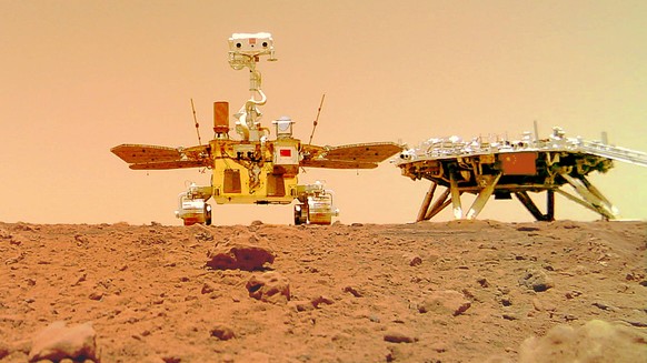 210611 -- BEIJING, June 11, 2021 -- Photo released on June 11, 2021 by the China National Space Administration CNSA shows a selfie of China s first Mars rover Zhurong with the landing platform. The Ch ...